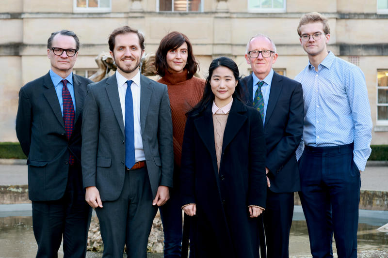 Finalists and judges small Photograph of the finalists and judges of the 9th annual Oxford Uehiro Prize in practical ethics.