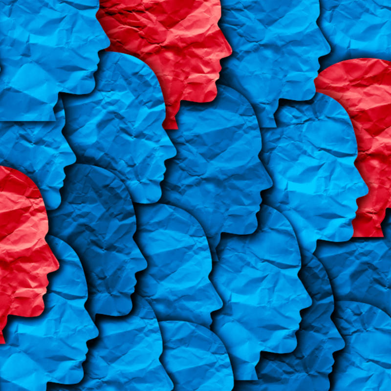 Herdimmunity redblue image of blue and red faces in profile representing herd immunity