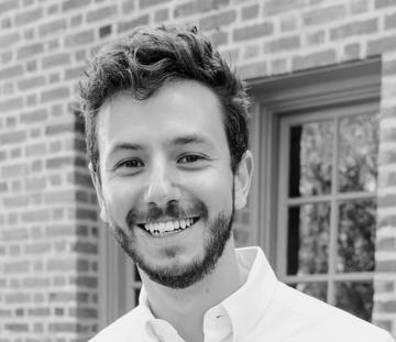 black and white headshot of Jacob Nebel smiling