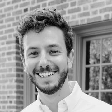 black and white headshot of Jacob Nebel smiling