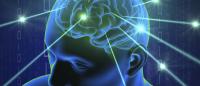 Mind and Machine A digital image of a brain in a transparent head, with lights shooting out of it, and coding in the background